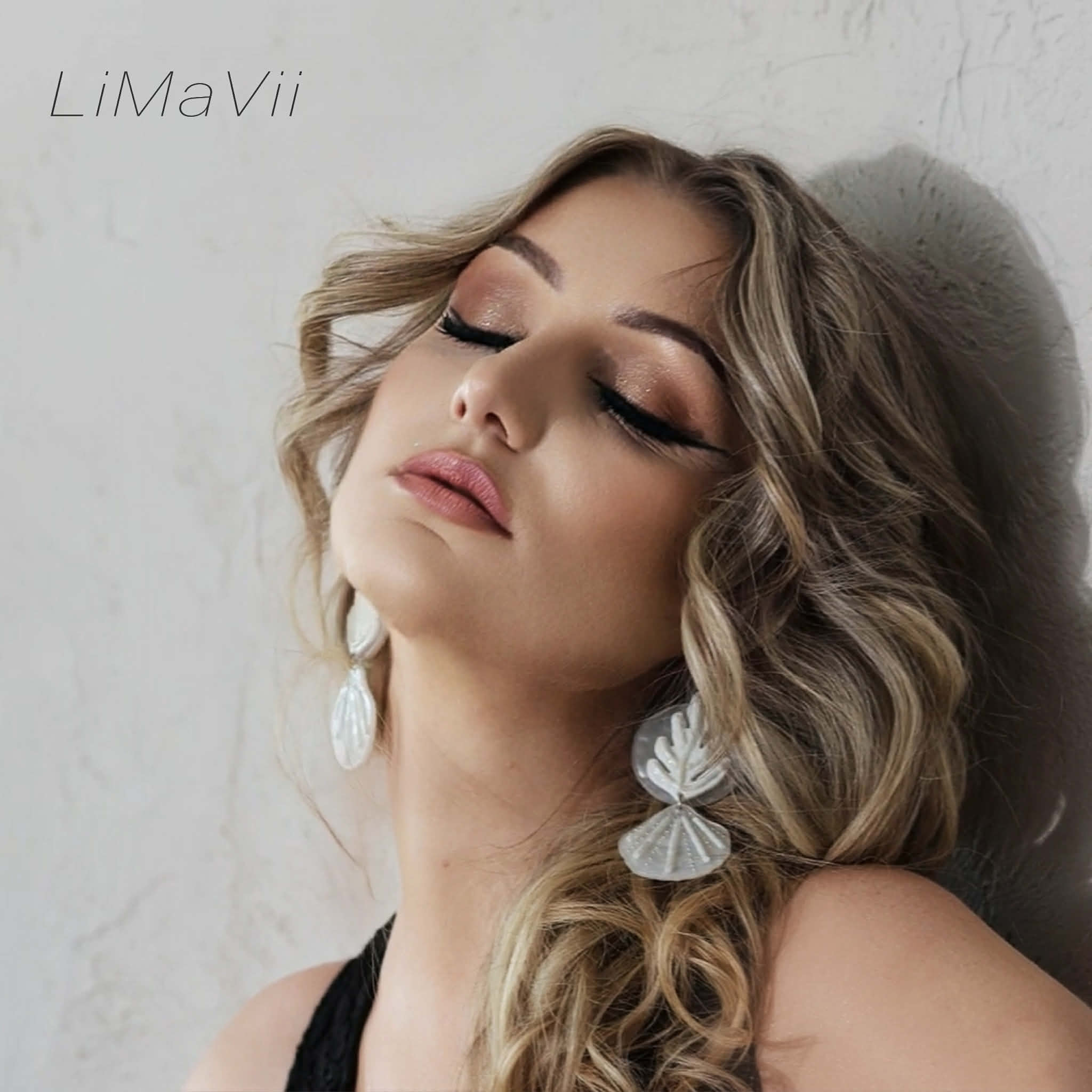 LUNAR ALCHEMY: LIMAVII CHANNELS THE PURPLE REIGN IN THE RADIANT PULSE OF “ELECTRIC MOON”